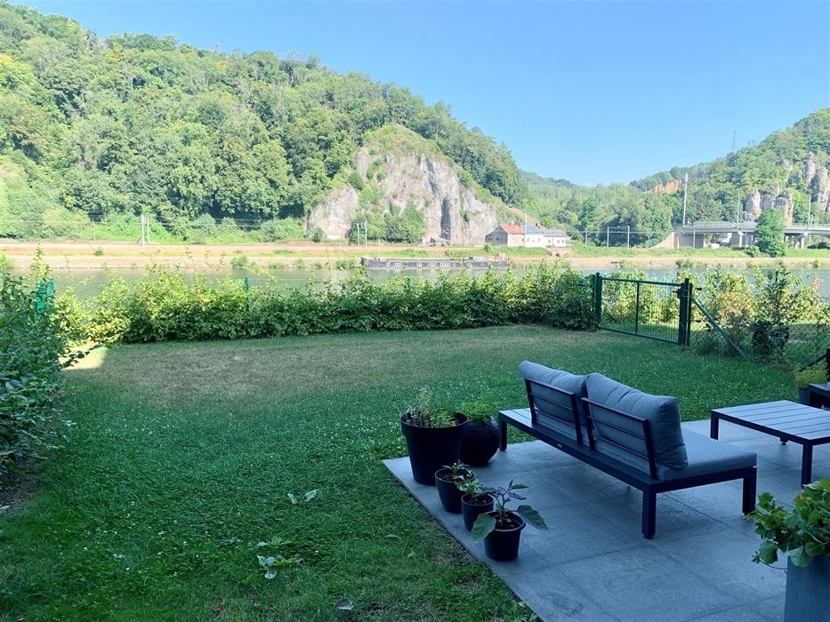 Absil Immobilière vous présente un superbe appartement avec jardin 