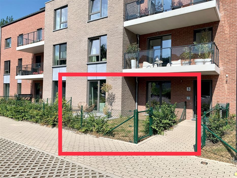 Absil Immobilière vous présente un superbe appartement avec jardin 
